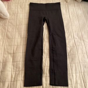 Woman’s black Lululemon leggings